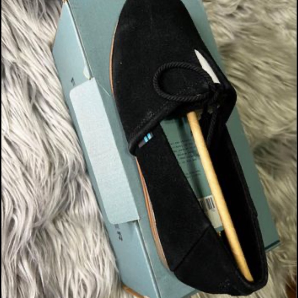 Brand new Toms never used